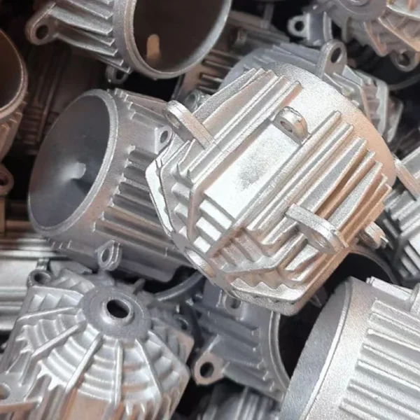 Sandblasting uses high-pressure gas to propel abrasive particles against metal surfaces