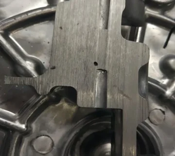 Shrinkage porosity defect inside aluminium die casting component