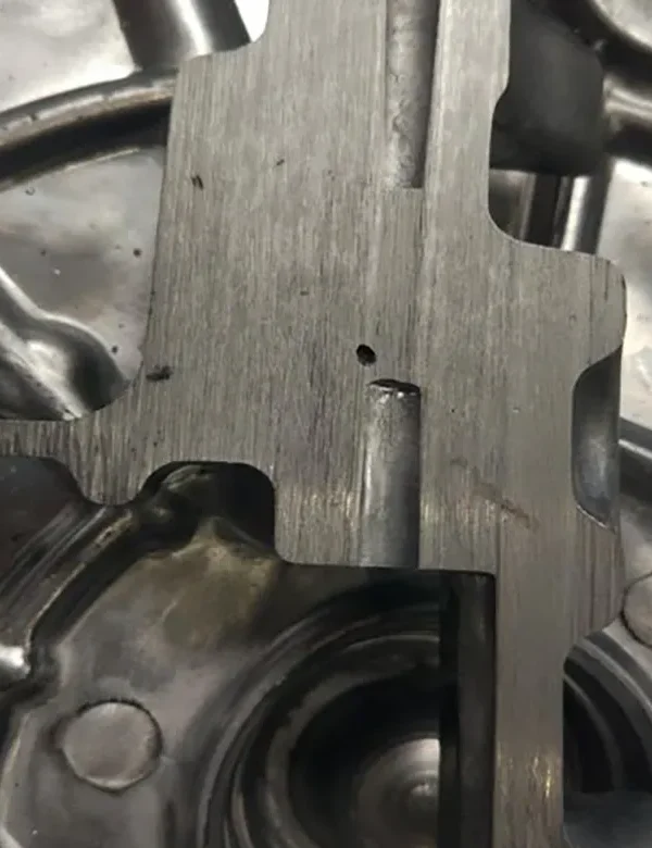 Shrinkage porosity defect inside aluminium die casting component