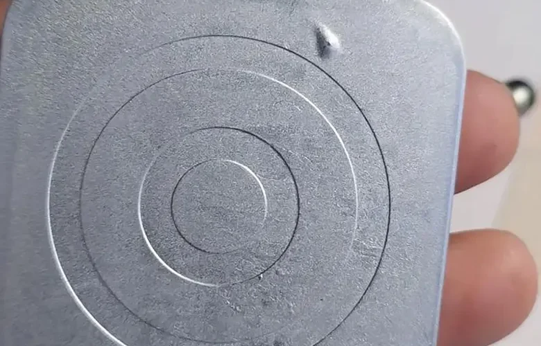 Surface blistering defect on a zinc die casting after plating